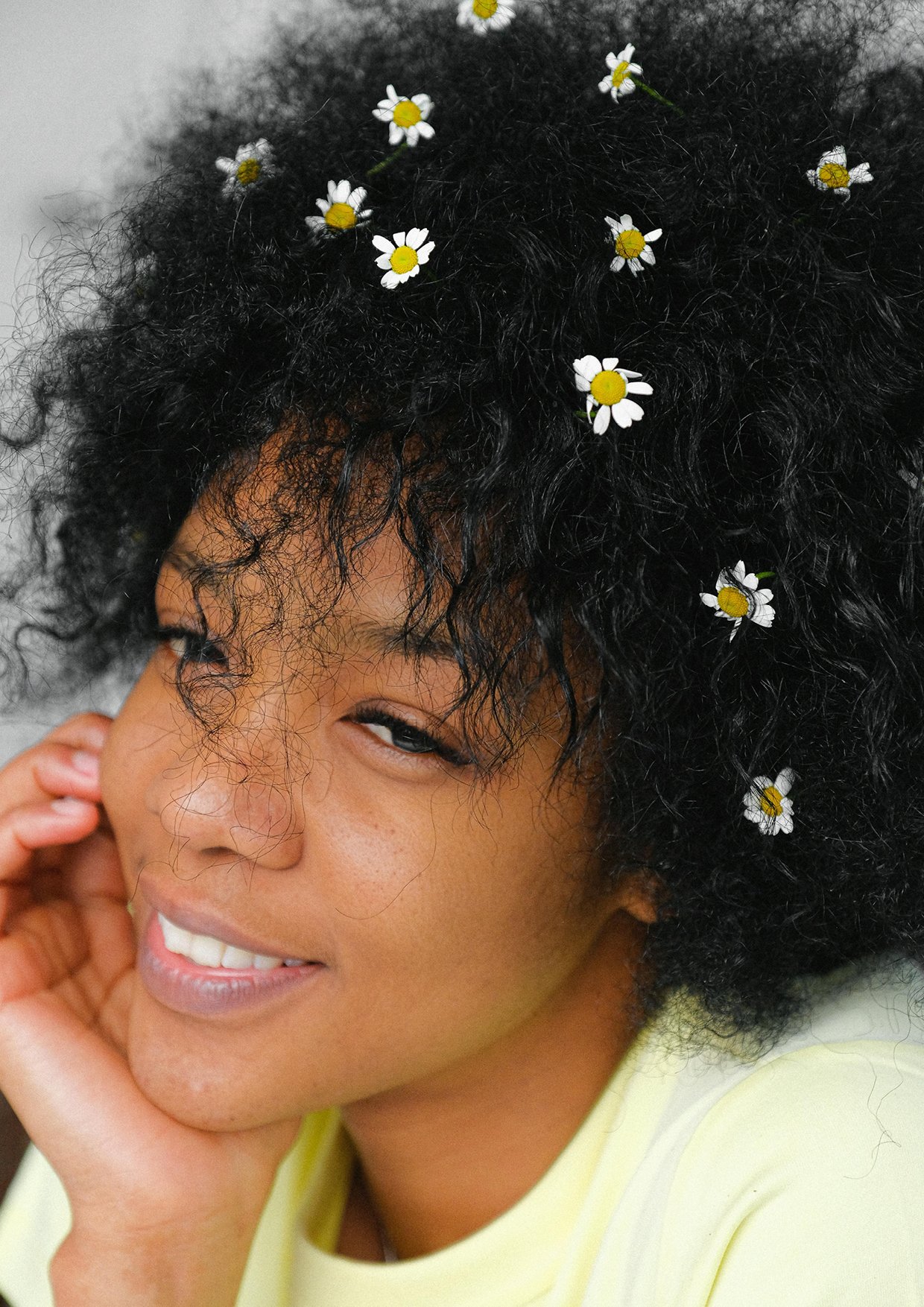 Smiling woman with curly red hair